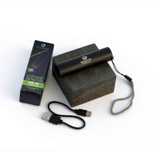 Polnilni UV‑detektor za urin Ecodor EcoLight postavljen na mizo
